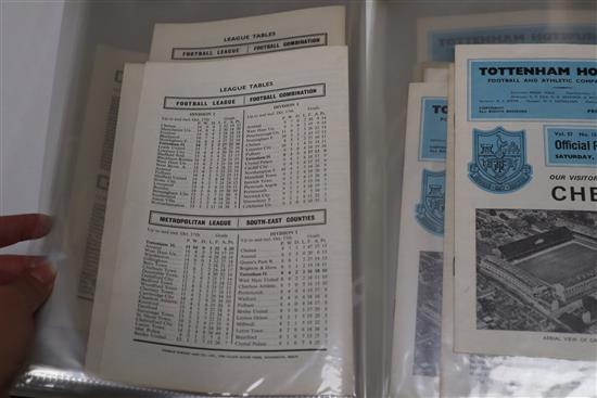 A large collection of Tottenham Hotspur memorabilia including programmes, official season handbooks, ticket stubs and a rattle,